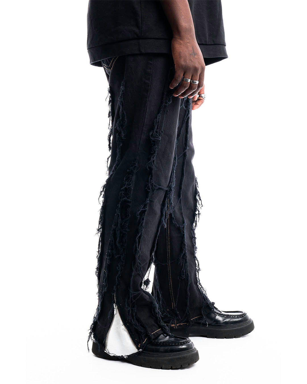 Black Ripped Denim Jeans by Prototypesparis, Made-to-Order Craftsmanship.
