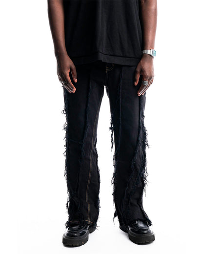 Black Ripped Denim Jeans by Prototypesparis, Refined Distressing with modern aesthetic.