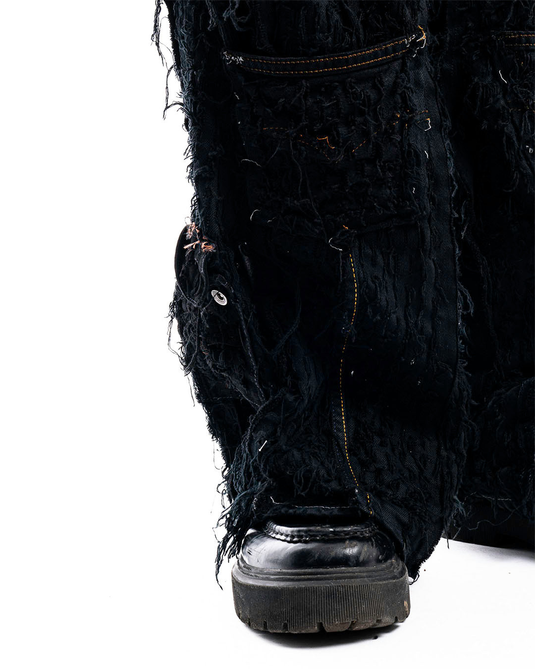 Zoom view of Obsidian Shred Denim Jeans by Prototypesparis, handcrafted artisanal designs