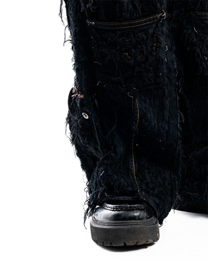 Zoom view of Obsidian Shred Denim Jeans by Prototypesparis, handcrafted artisanal designs